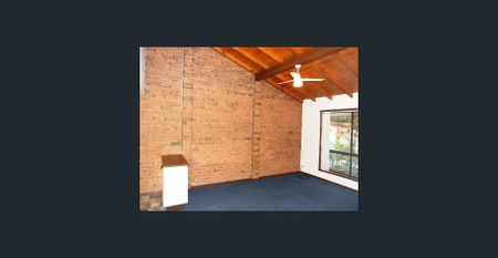 Low-Maintenance unit Walking Distance to Shops, Schools & Transport! - Photo 2