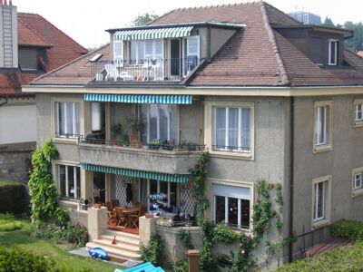 Appartement de 5 pièces au 1er avec balcon et vue sur le lac. - Photo 1