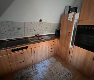 Vollmöblierte Dachgeschosswohnung in zentraler Innenstadtlage - Photo 4