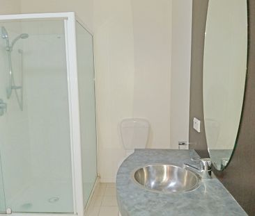 Townhouse Living in fully gated complex with 2 carparks - Photo 4