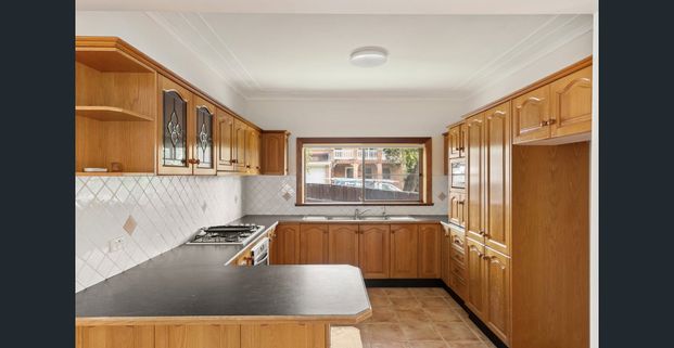 Conveniently Positioned with Side Access to Rear Yard - Photo 1