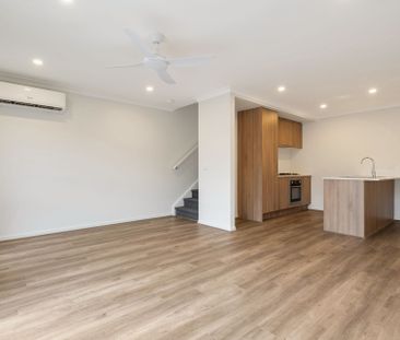 Be the first to call this stunning townhouse home - Photo 1