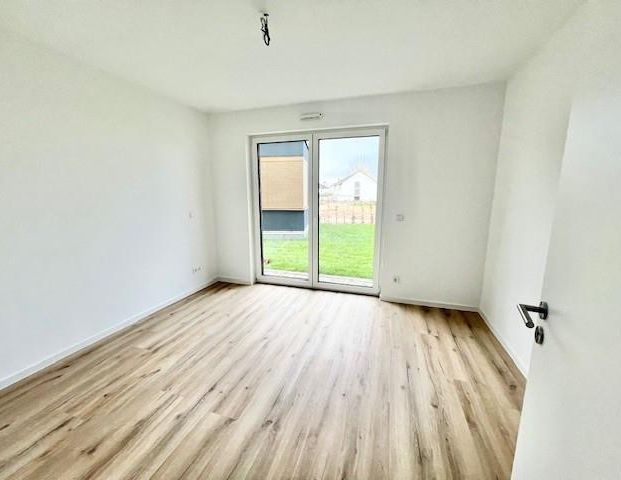 Neubau Erstbezug! Traumwohnung mit XXL-Garten! - Foto 1