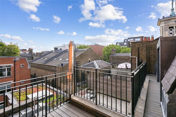 Arranged over two floors, a stunning three bedroom property with two private terraces. - Photo 1