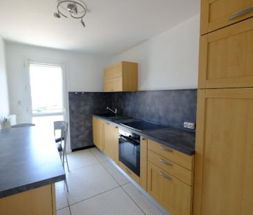 Location Appartement 4 pièces 70m² ST ETIENNE 42000 - Photo 3