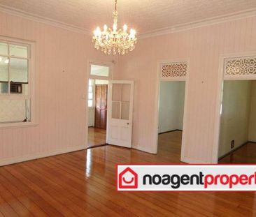 Spacious Four-Bedroom Queenslander with Timeless Charm in Clayfield - Photo 3