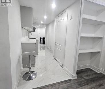 Brand new furnished basement unit - Photo 4