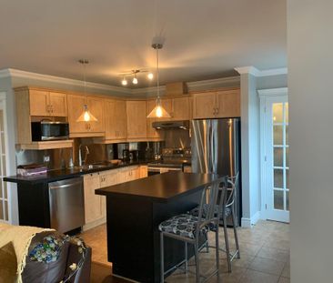 4 1/2 condo a louer Beauport - Photo 2