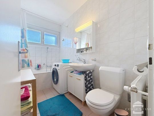 Bel appartement de 2.5 pièces proche du centre-ville - Photo 1