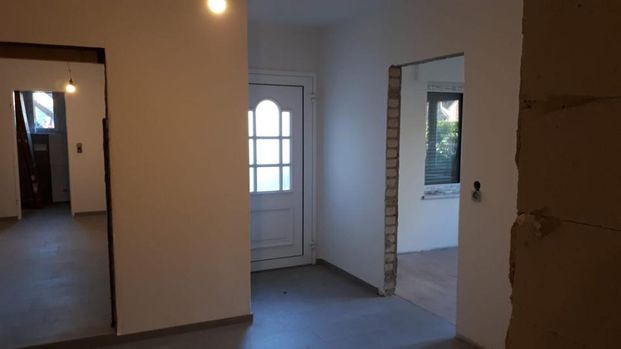 Hochwertig kernsanierte 4-Zimmer-Erdgeschosswohnung mit Garten - Photo 1