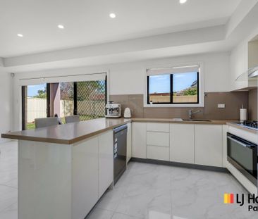 Stylish Four-Bedroom Home in a Prime Location - Photo 5