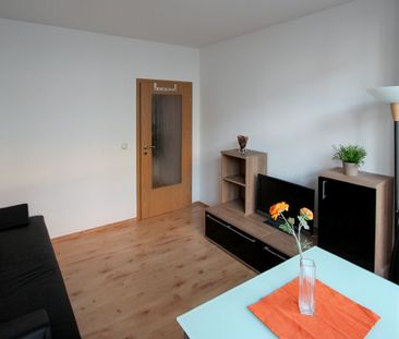 Ihre flexible und möblierte Wohnlösung mit Balkon in perfekter Lage! - Foto 1