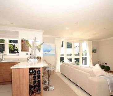 A modern first floor apartment in a gated development. - Photo 4