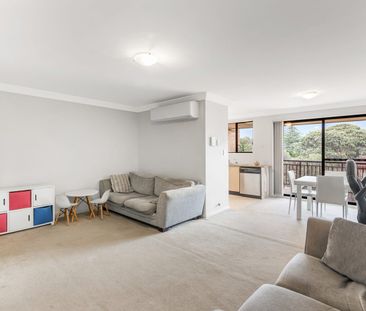 Top floor unit in central location - Photo 1