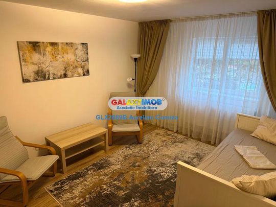 Garsoniera renovata total Gorjului - Fotografie 1