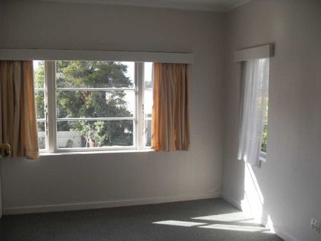 This is a tidy, character three bedroom upstairs unit with all original fittings. - Photo 2