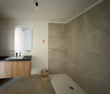 Nieuwbouwwoning met 3 slaapkamers en tuin. - Photo 1