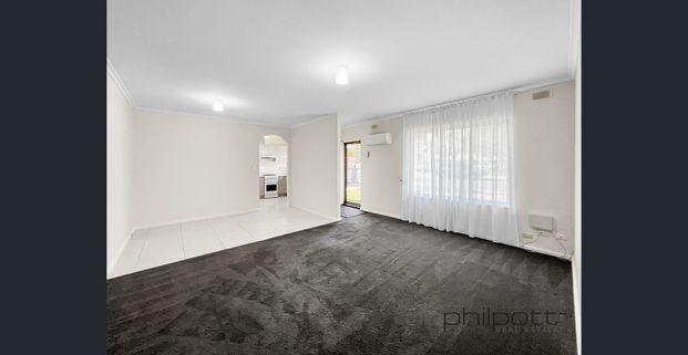 UPDATED UNIT IN A GREAT LOCATION! - Photo 1