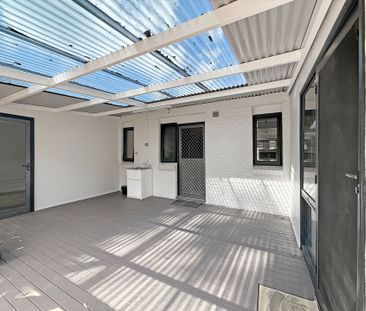 BEAUTIFULLY RENOVATED 4 BEDROOM HOME - Photo 4