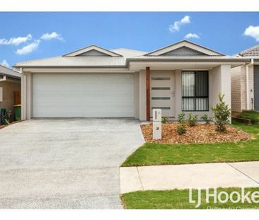 Modern Family Home with Stylish Finishes & Low-Maintenance Living - Photo 1