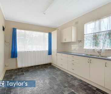 CONVENIENTLY LOCATED UPDATED FAMILY HOME - Photo 1