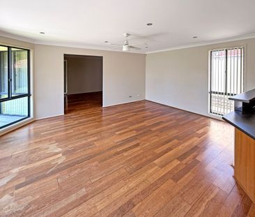 THE IDEAL FAMILY HOME IN SOUGHT-AFTER WARNERS BAY - Photo 1