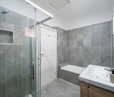 Beautifully Renovated Home with Flexible Living Options - Photo 3