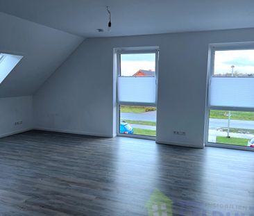 Moderne 2-Zimmer-Oberwohnung mit Balkon in Warsingsfehn! - Foto 6