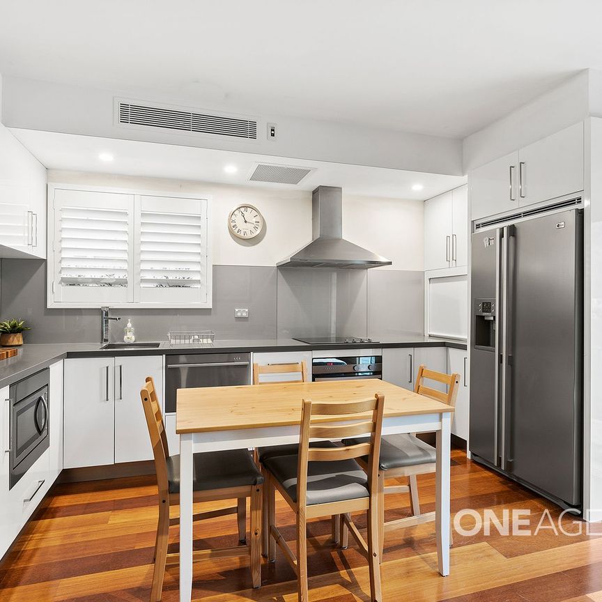 MODERN UNIT WITH WATER VIEWS AND BEACHFRONT LOCATION - Photo 1