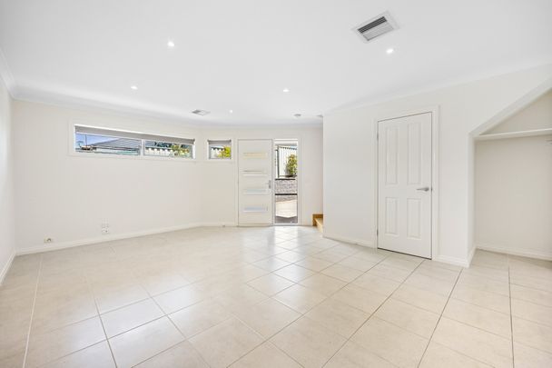 Private And Secure Townhouse In Central Location - Photo 1