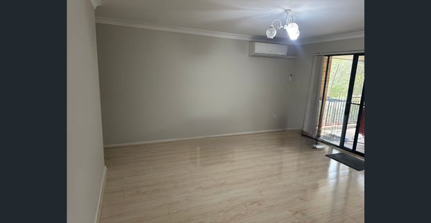Spacious Top-Floor 2 Bedroom Unit with Lock-Up Garage & Balcony - Photo 1