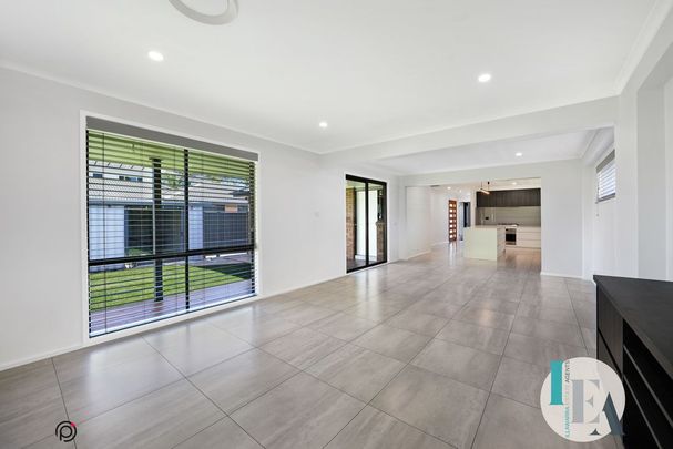 Modern 4-Bedroom Family Home in Prime Albion Park Location - Photo 1
