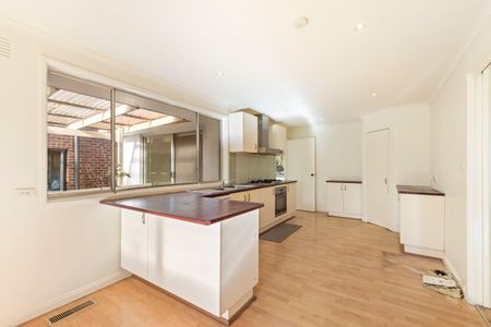 Comfortable Family Living in a Spacious Brick Home - Photo 5