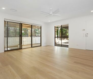 RENOVATED DUPLEX WITH POOL AND TENNIS COURT IN COMPLEX - Photo 1