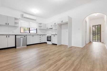 Refurbished Family Home with Huge Rear Yard - Photo 4