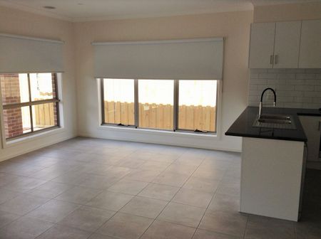 AS NEW THREE BEDROOM HOME - Photo 4