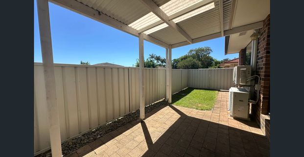 Charming two-bedroom villa, a delightful blend of comfort and convenience nestled in the heart of Coffs Harbour. - Photo 1