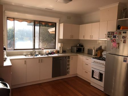 Three Bedroom Home with a Large Backyard - Photo 4