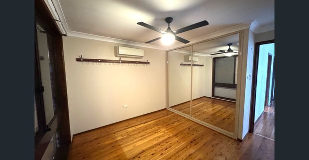 Unique Family Home in Prime Quakers Hill Location! - Photo 1