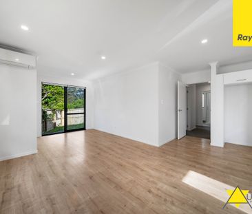 Comfort and Convenience Near Titirangi Village - Photo 1