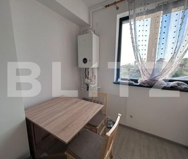 Garsoniera decomandata, incalzire in pardoseala, parcare privata - Fotografie 3