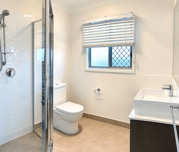Modern 3-Bedroom Dual Key Home – Convenient Redbank Plains Location - Photo 4