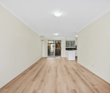 Stunning Townhouse in Secure Complex! - Photo 1