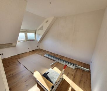 Erstbezug nach Komplettsanierung: Moderne 3-Zi.-DG-Wohnung in Lübec... - Photo 3