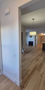 Spacious and Bright 1-Bedroom + Den Suite in Exclusive Bear Mountain - Photo 3