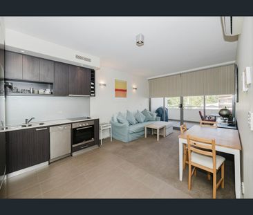 City at your Doorstep- Fully Furnished & Equipped with Gym - Photo 5