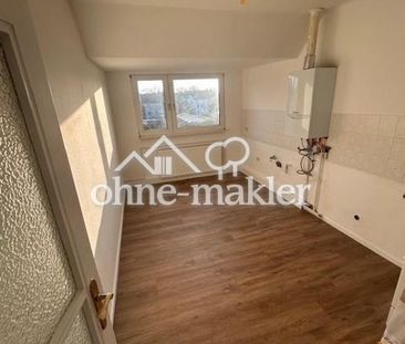 Helle Dachgeschosswohnung mit gemütlichem Grundriss in zentraler Wo... - Photo 3