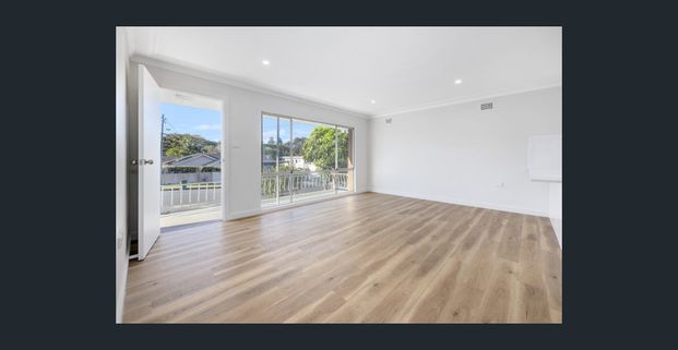 Relaxed Coastal Living in a Prime Flynns Beach Location - Photo 1