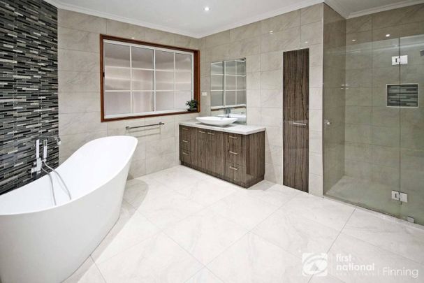 Sitting Amongst the Flowers - Photo 1