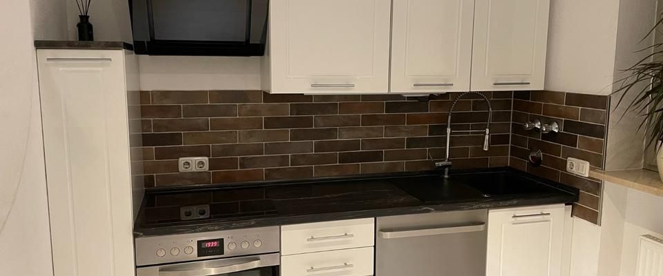 Gemütliche 1,5-Zimmer-Souterrain-ETW mit Duplex-Stellplatz - Photo 1